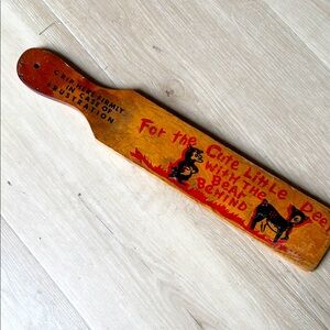 Vintage Wooden Paddle with Red and Black Design